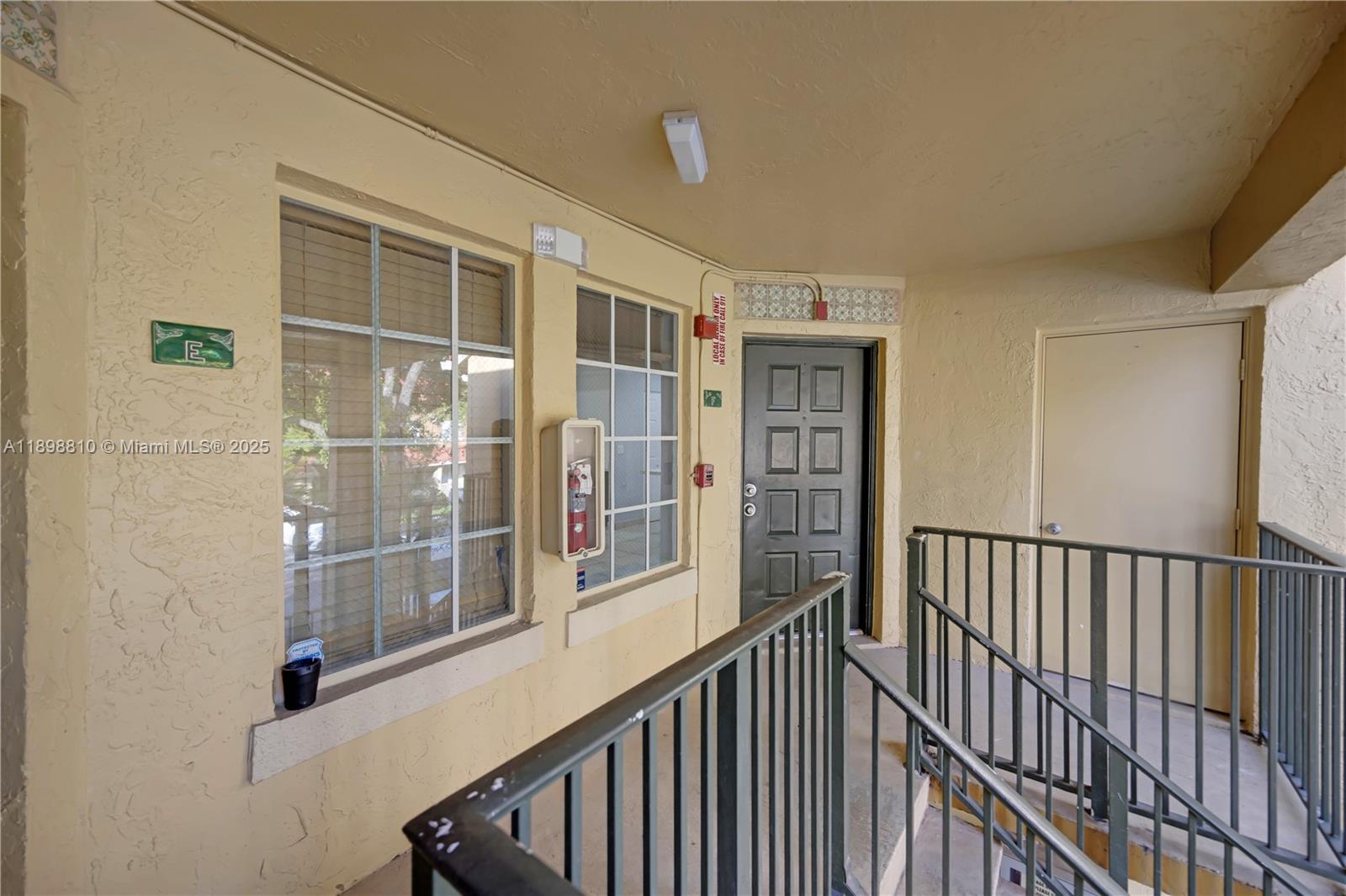 18350 Northwest 68th Avenue, Unit F Hialeah, FL 33015 - Photo 4 of 43 Front door and Storage Room
