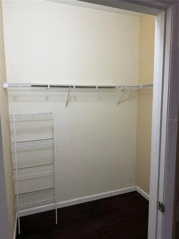 a view of small space with racks on the wall