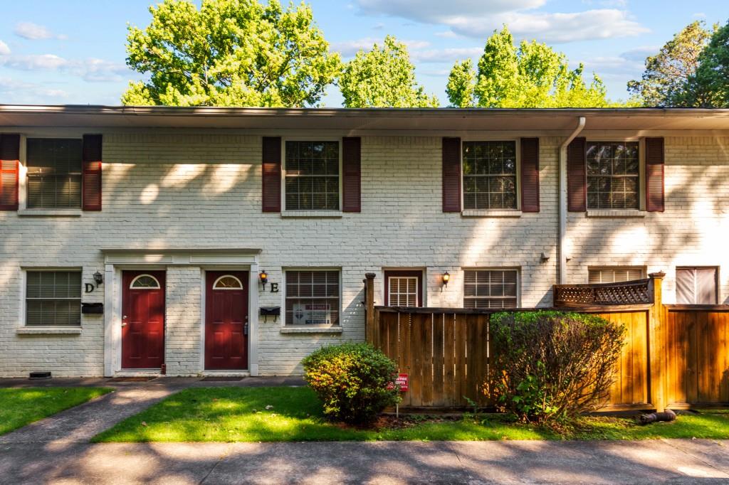 771 Jordan Lane, Unit E Decatur, GA 30033 - Photo 1 of 1 a front view of a house with a yard