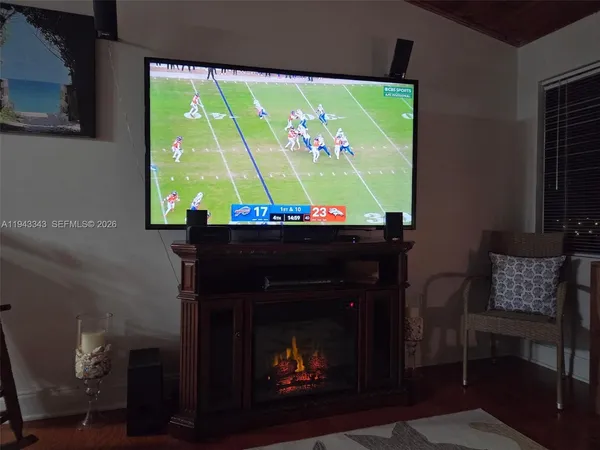 a room with furniture and a fireplace