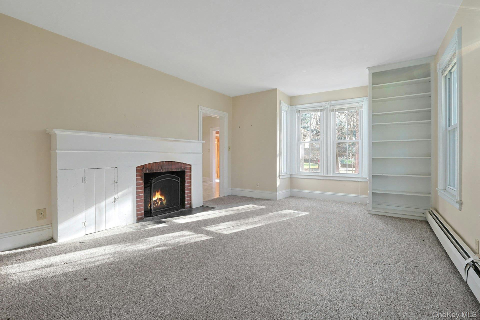 46 Mile Road Montebello, NY 10901 - Photo 12 of 25 Living room w/wood burning fireplace