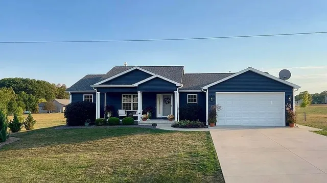 a front view of house with yard
