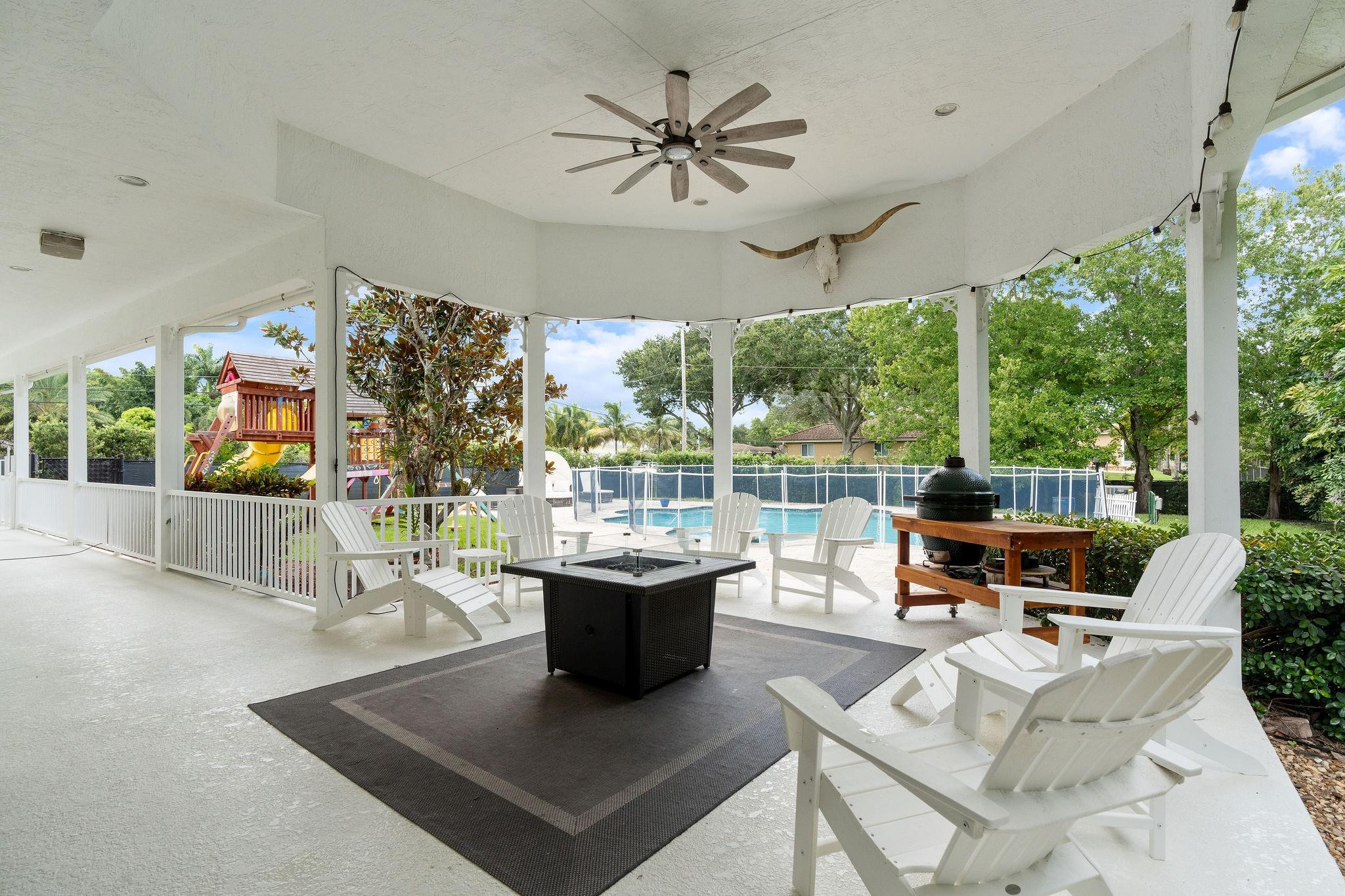 17000 Southwest 63rd Manor Southwest Ranches, FL 33331 - Photo 14 of 58 SCREEN-IN PATIO