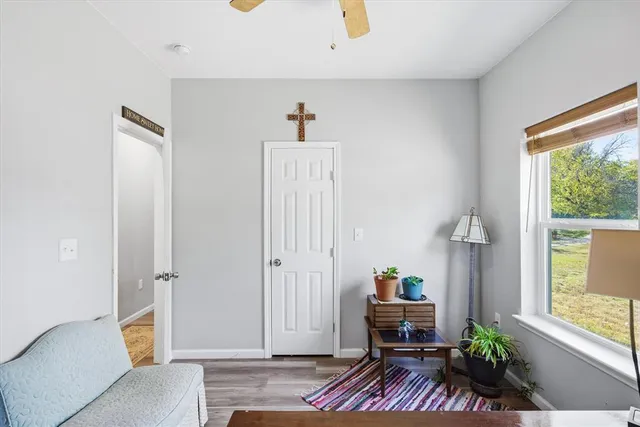 a room with furniture and window