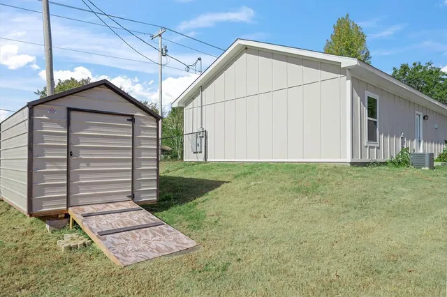 a outdoor living space with furniture and garden view
