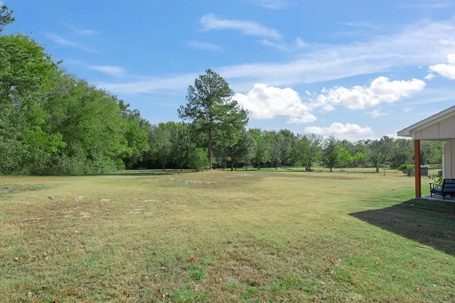 a view of outdoor space and yard