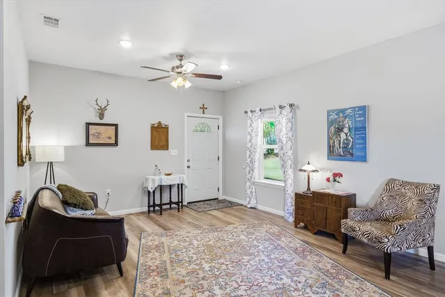 a large open kitchen with a refrigerator stove and oven