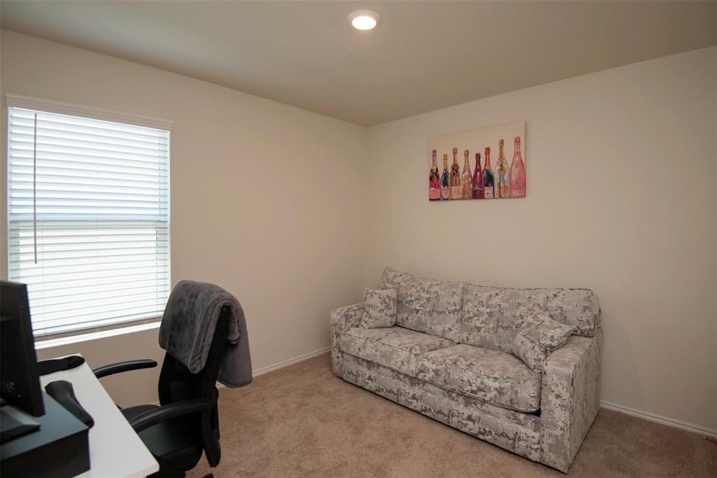 1215 Fairford Road Crandall, TX 75114 - Photo 14 of 20 a living room with furniture and a window