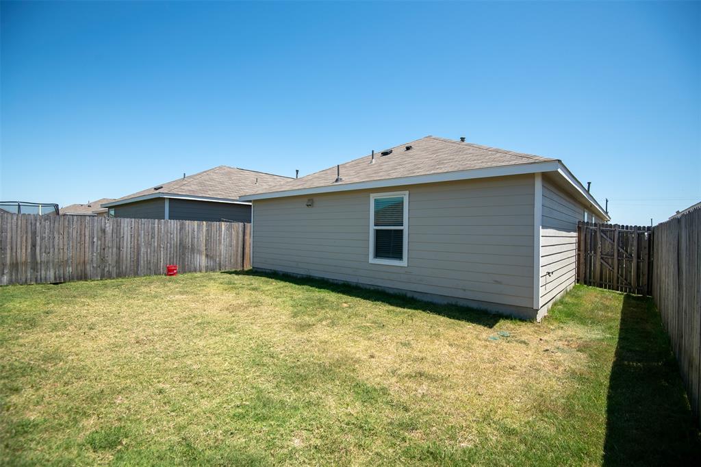 1215 Fairford Road Crandall, TX 75114 - Photo 15 of 20 a view of a backyard