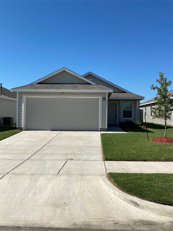 1215 Fairford Road Crandall, TX 75114 - Photo 1 of 20 a front view of a house with a yard