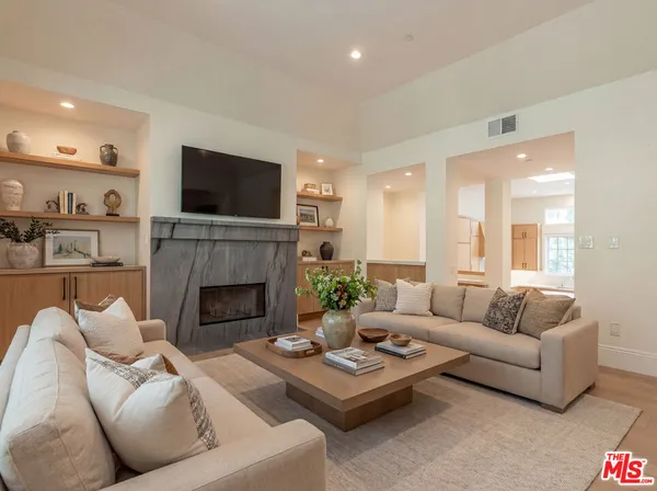 a view of a livingroom with a fireplace