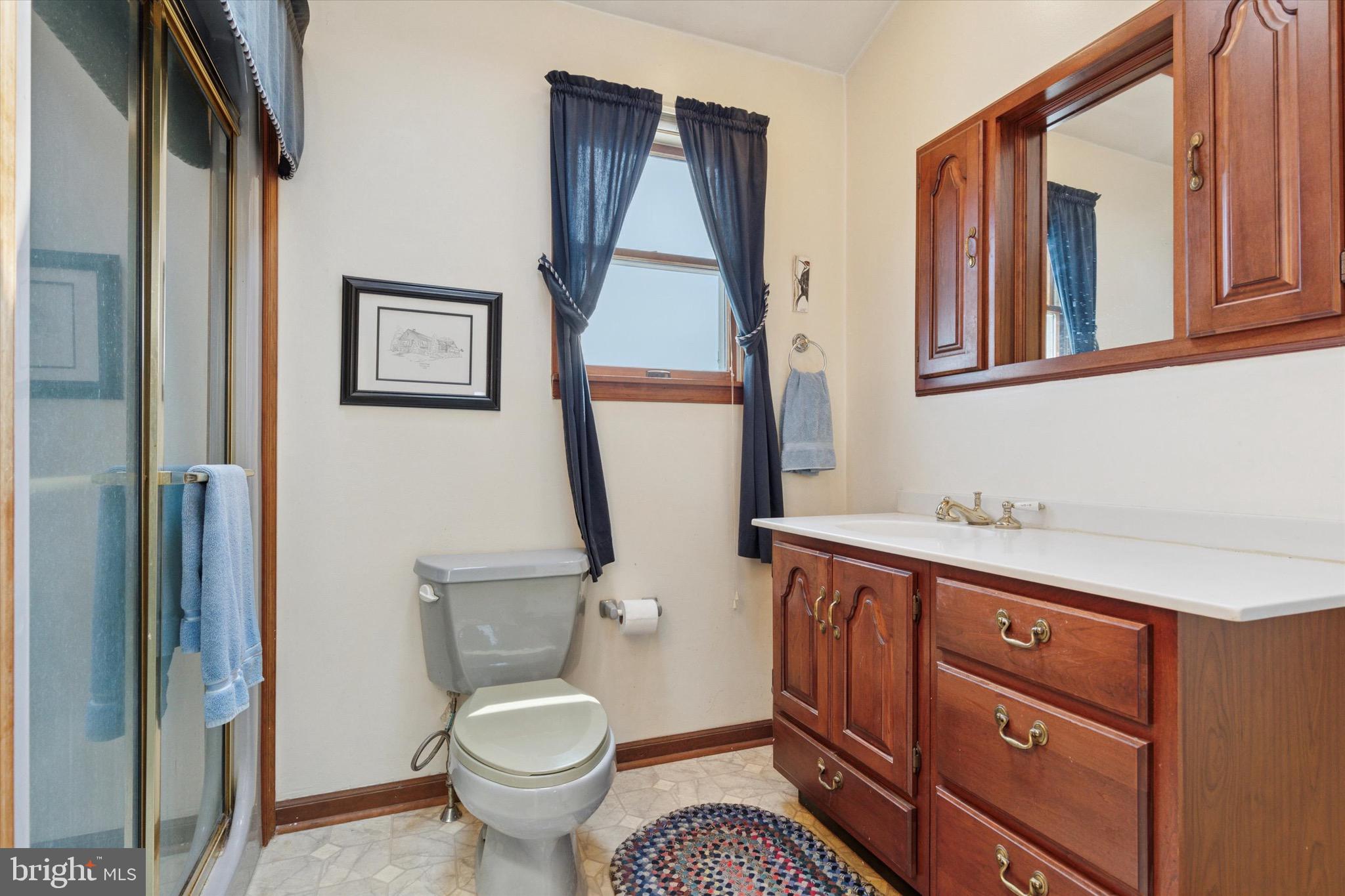 159 Hunt Drive Horsham, PA 19044 - Photo 19 of 31 a bathroom with a toilet a sink and a mirror