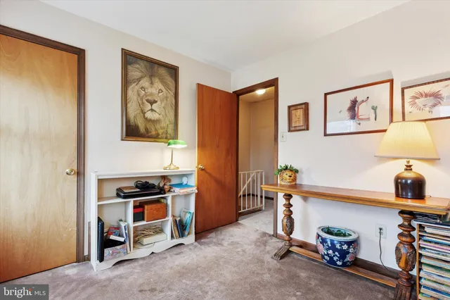 a view of room with furniture and a window