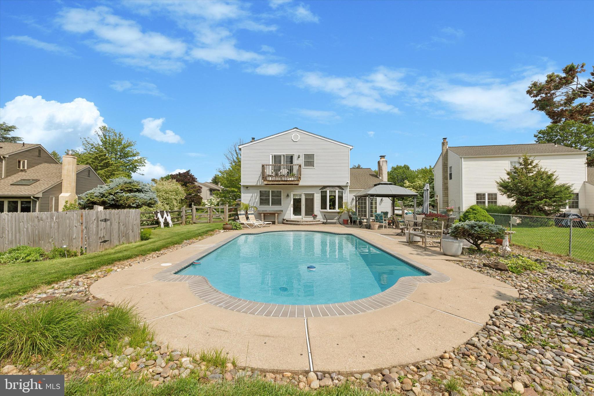 159 Hunt Drive Horsham, PA 19044 - Photo 7 of 31 a view of a house with pool and a yard