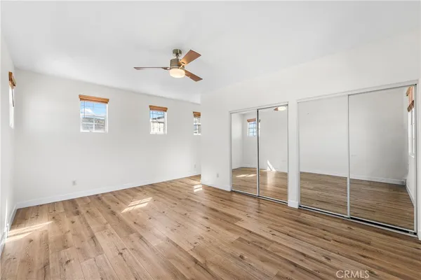 a view of a house with a yard porch and sitting area