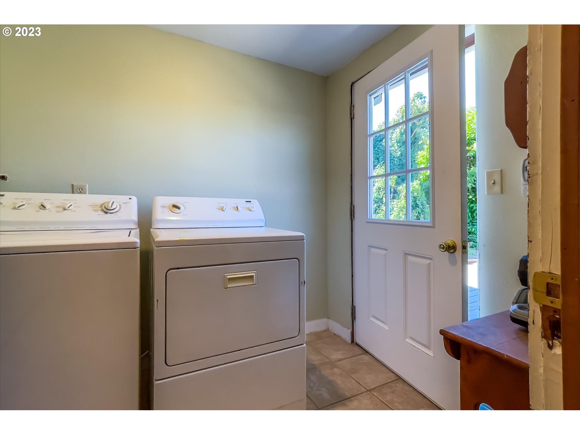 945 2nd Street Southeast Bandon, OR 97411 - Photo 13 of 29 a utility room with dryer and washer