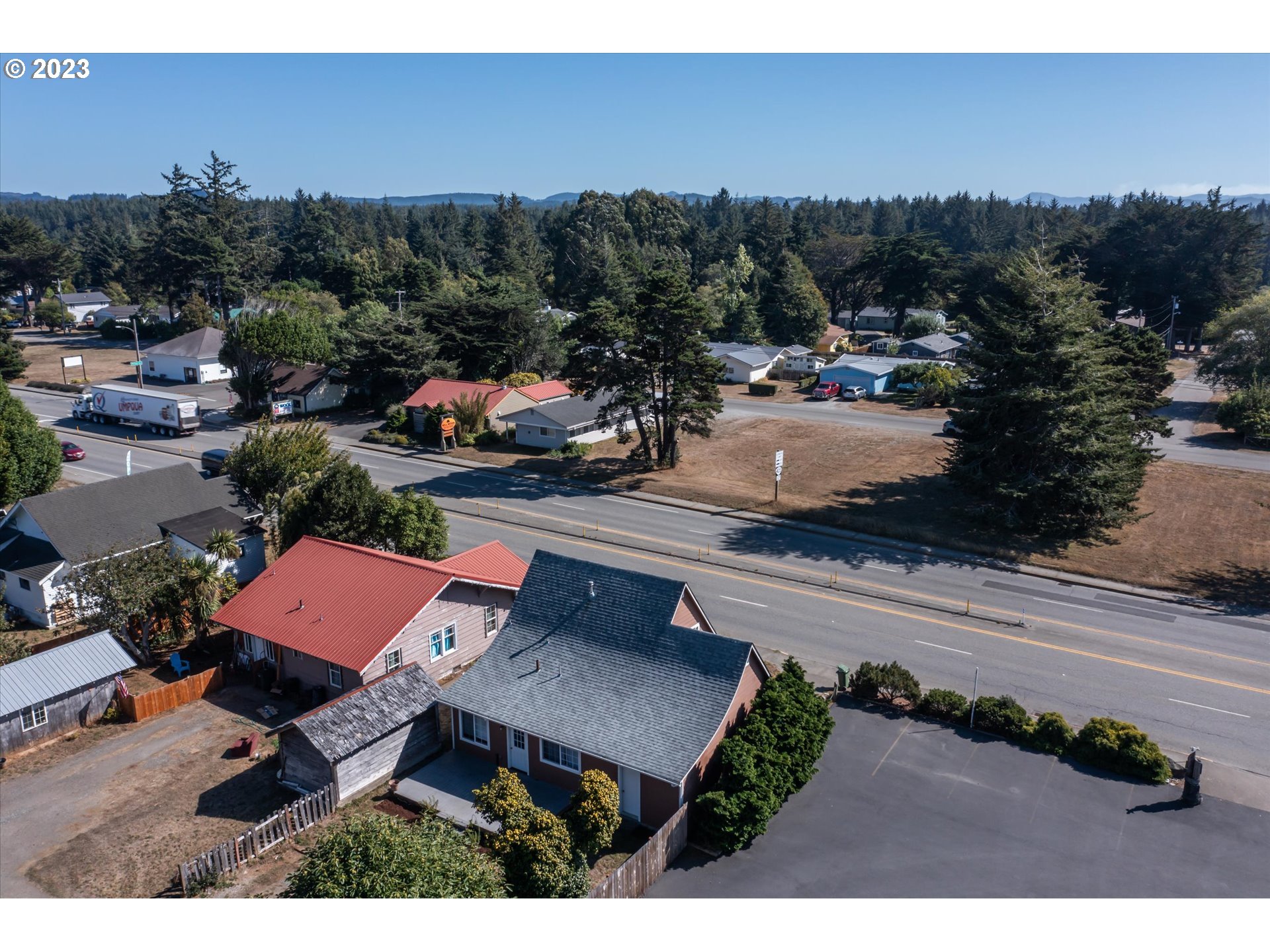 945 2nd Street Southeast Bandon, OR 97411 - Photo 27 of 29 a view of a city with sunset view