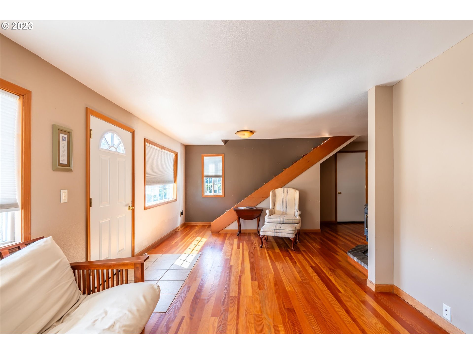 945 2nd Street Southeast Bandon, OR 97411 - Photo 5 of 29 a view of an empty room and wooden floor