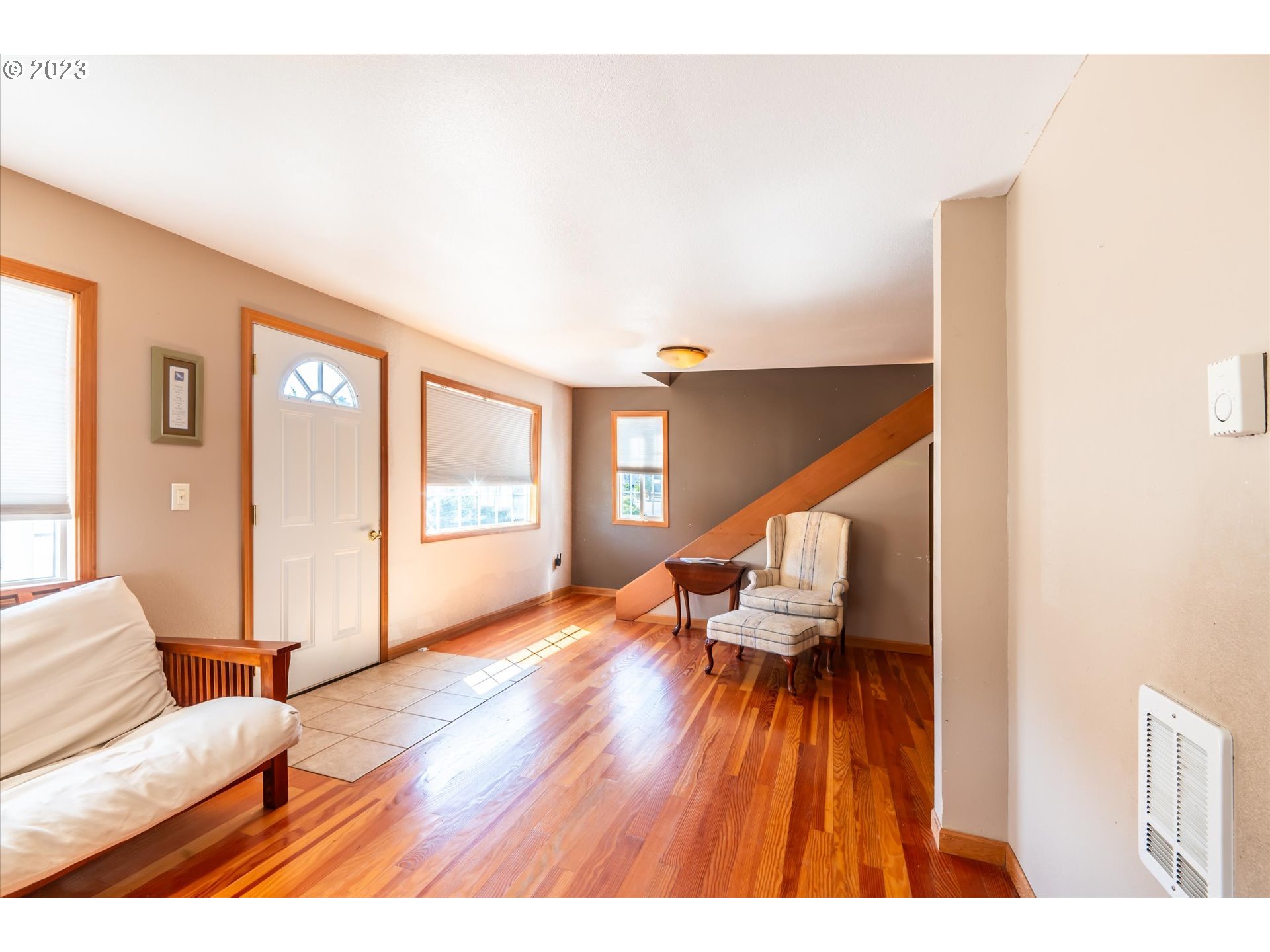 945 2nd Street Southeast Bandon, OR 97411 - Photo 9 of 29 a living room with furniture and wooden floor