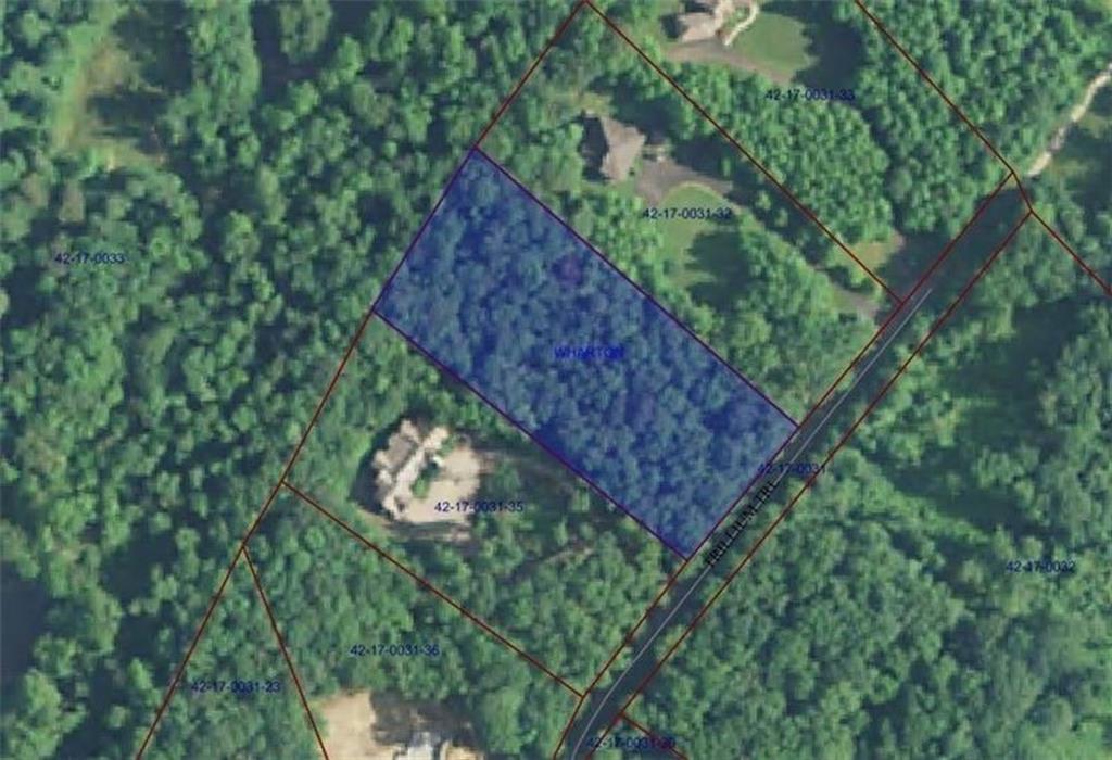 28 Trillium Trail Farmington, PA 15437 - Photo 2 of 2 a wooden fence with some trees