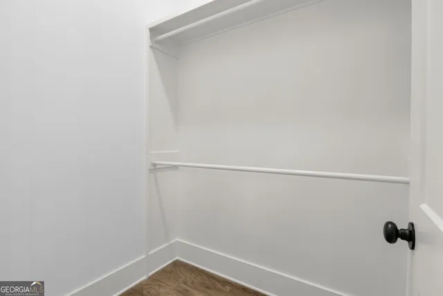 a bathroom with a double vanity sink and mirror