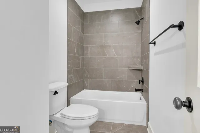 a view of entrance gate of a house