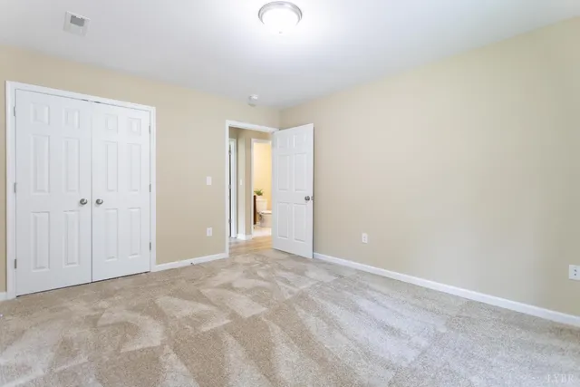 a view of a backyard with sitting area