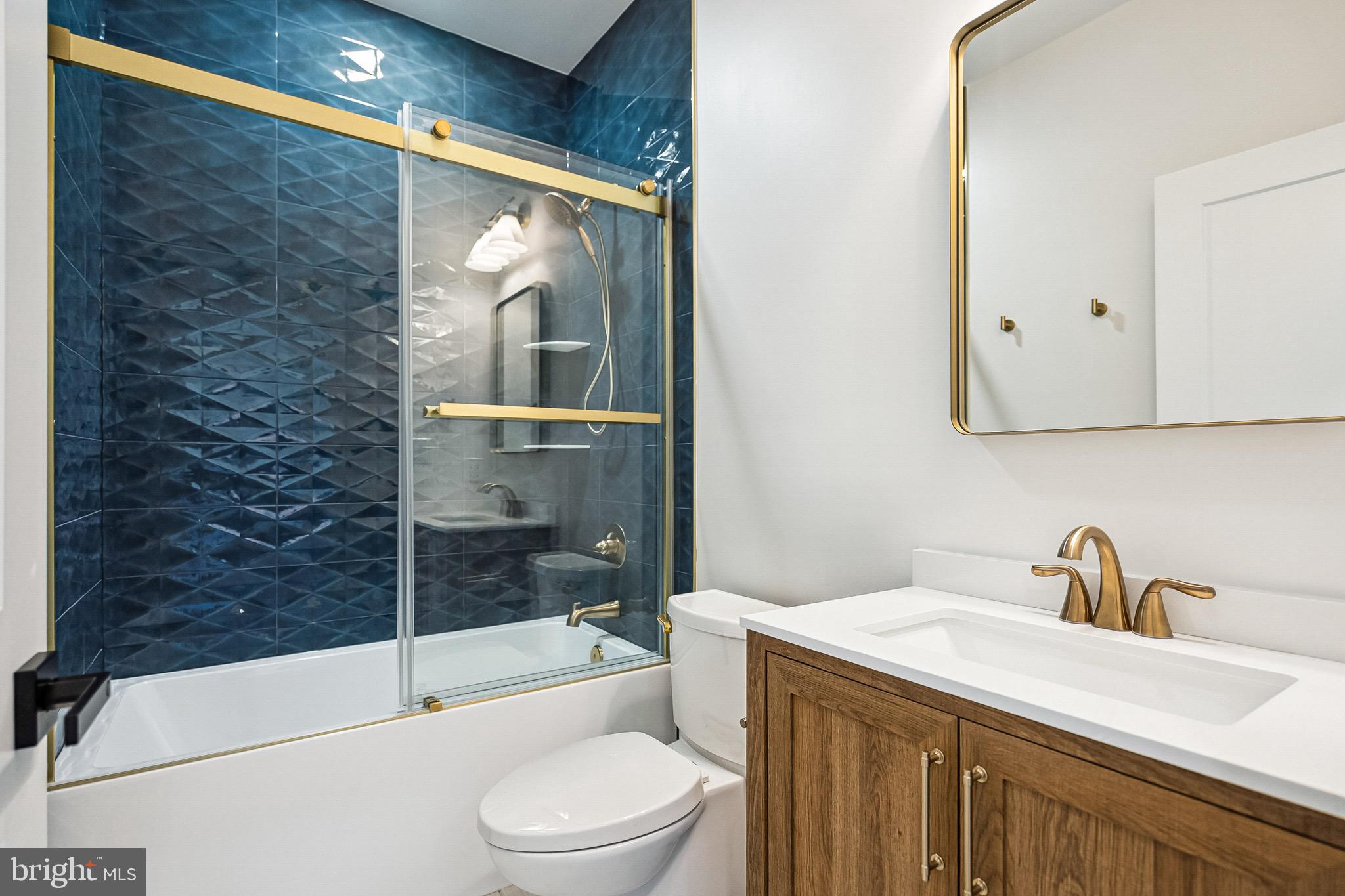 3651 Hanover Pike Manchester, MD 21102 - Photo 13 of 16 a bathroom with a sink a toilet and bathtub