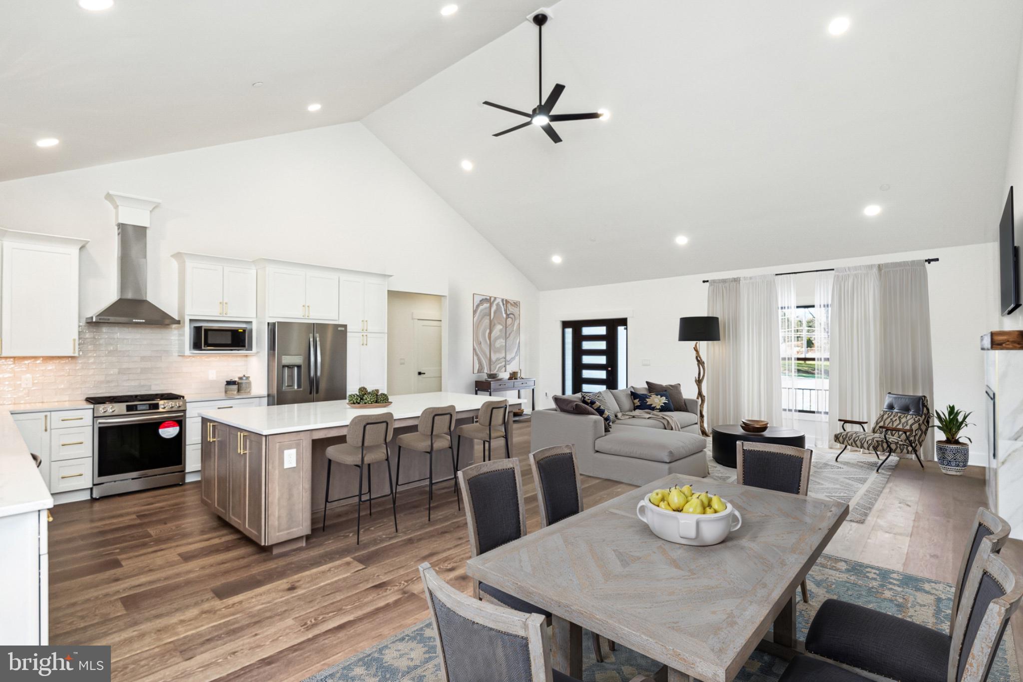 3651 Hanover Pike Manchester, MD 21102 - Photo 20 of 30 a view of kitchen that has a table chairs stainless steel appliances and wooden floor