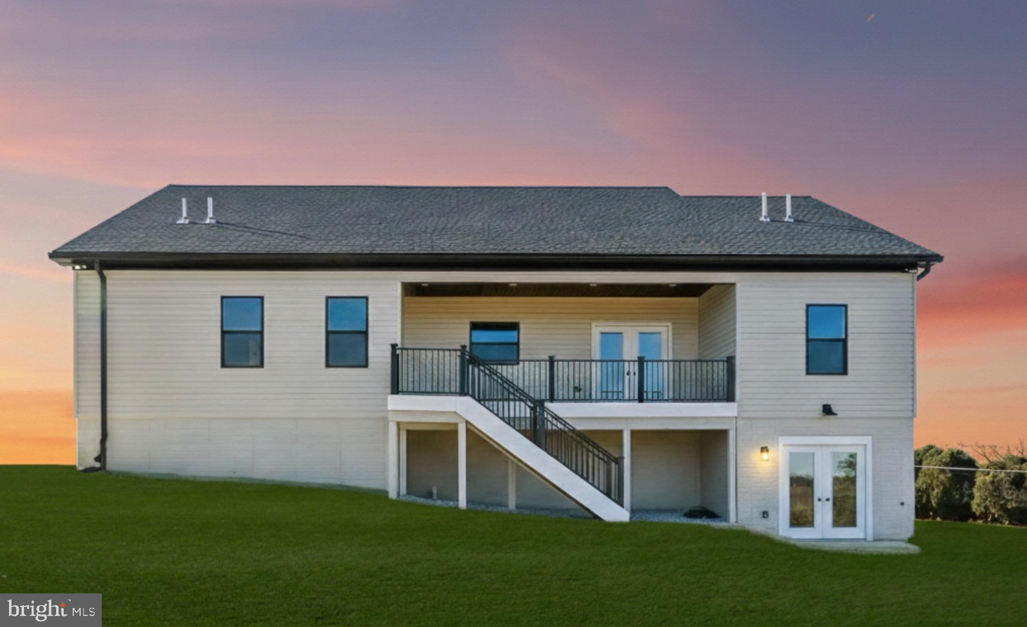 3651 Hanover Pike Manchester, MD 21102 - Photo 2 of 16 a front view of a house with a yard