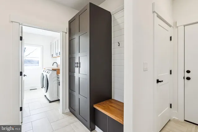 a bathroom with a tub and shower