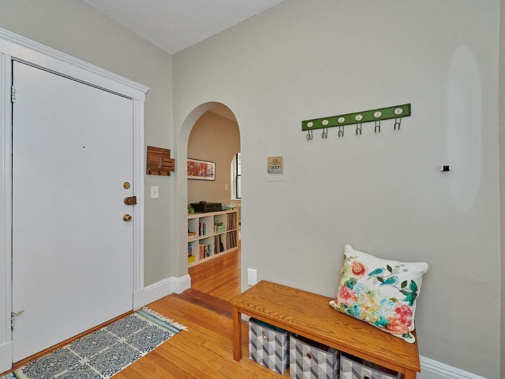 2 Sutherland Road, Unit 2 Boston, MA 02135 - Photo 9 of 11 a view of room with baby crib and furniture