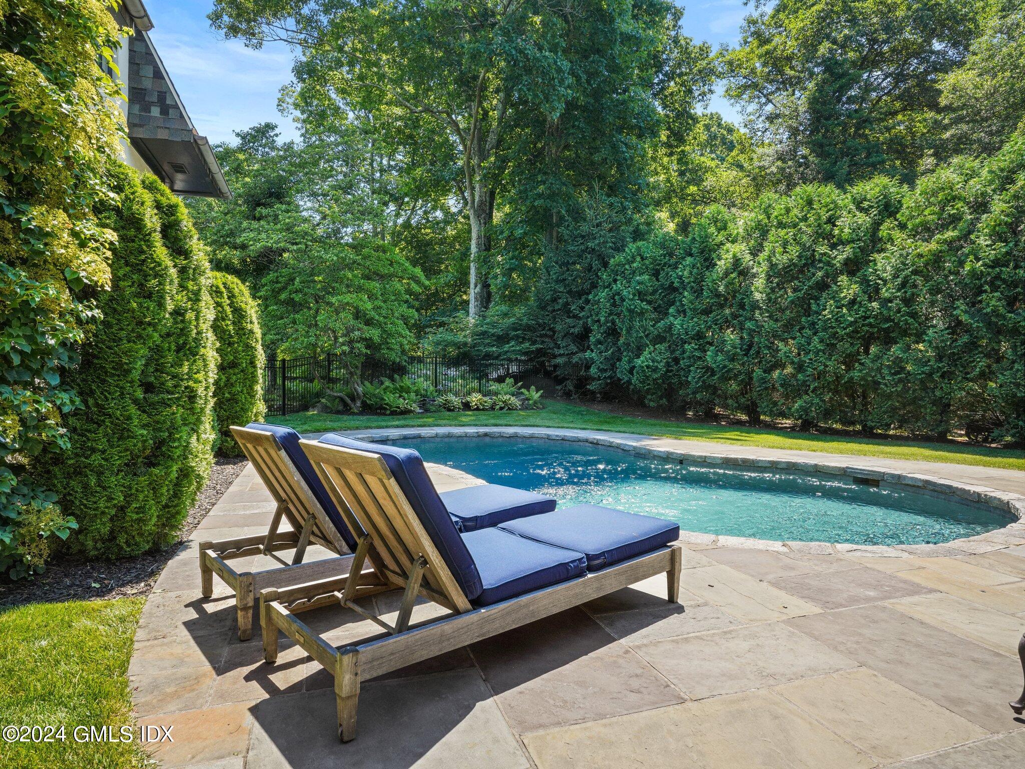 80 Porchuck Road Greenwich, CT 06831 - Photo 22 of 29 a view of a park with large trees