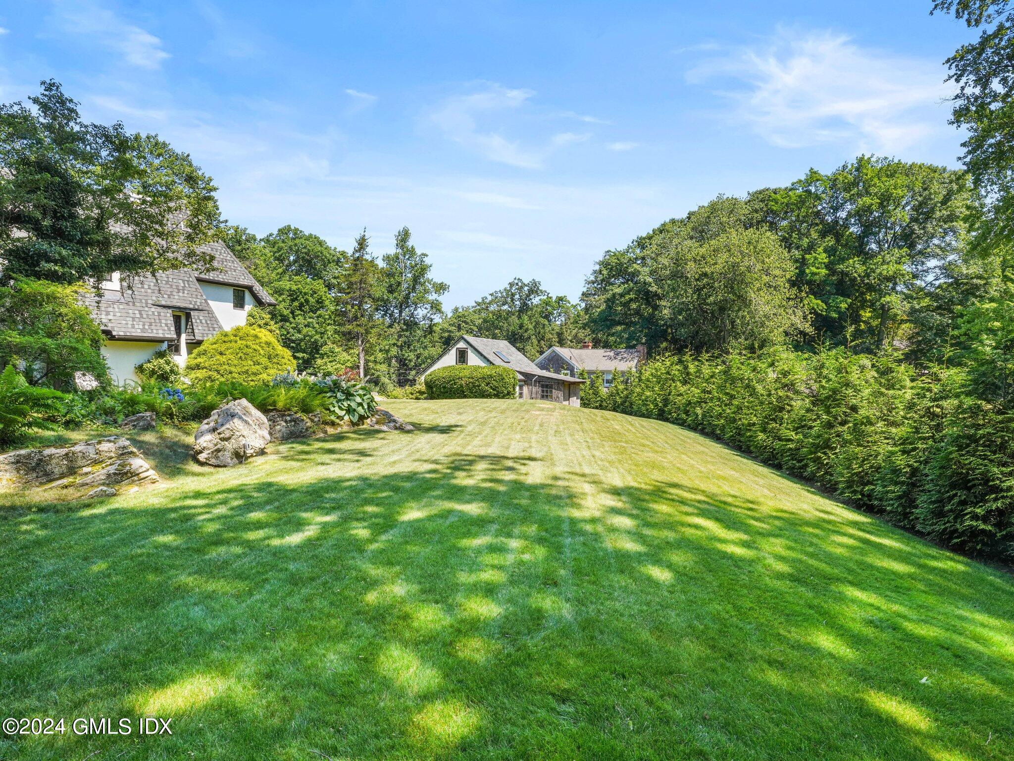 80 Porchuck Road Greenwich, CT 06831 - Photo 28 of 29 a view of a backyard