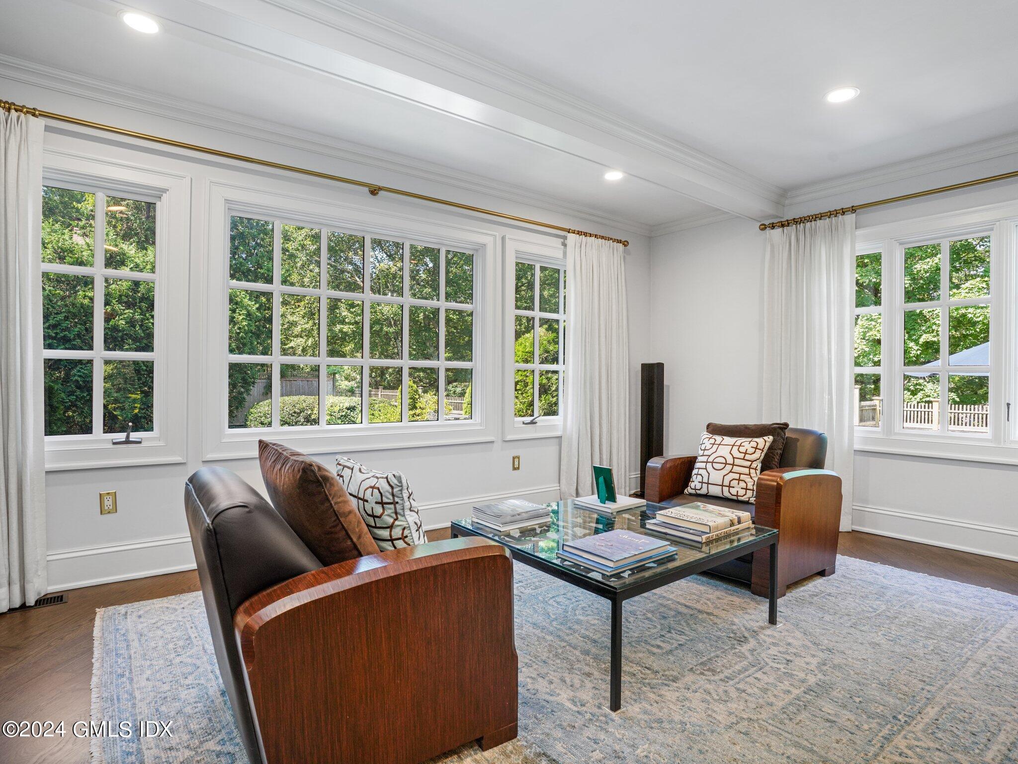 80 Porchuck Road Greenwich, CT 06831 - Photo 8 of 29 a living room with furniture and a window