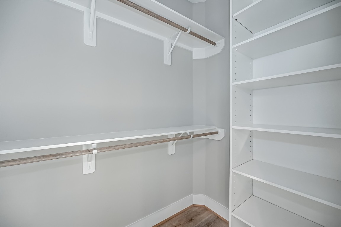 1718 Hardy Street Houston, TX 77026 - Photo 16 of 23 a view of a room with racks on the wall