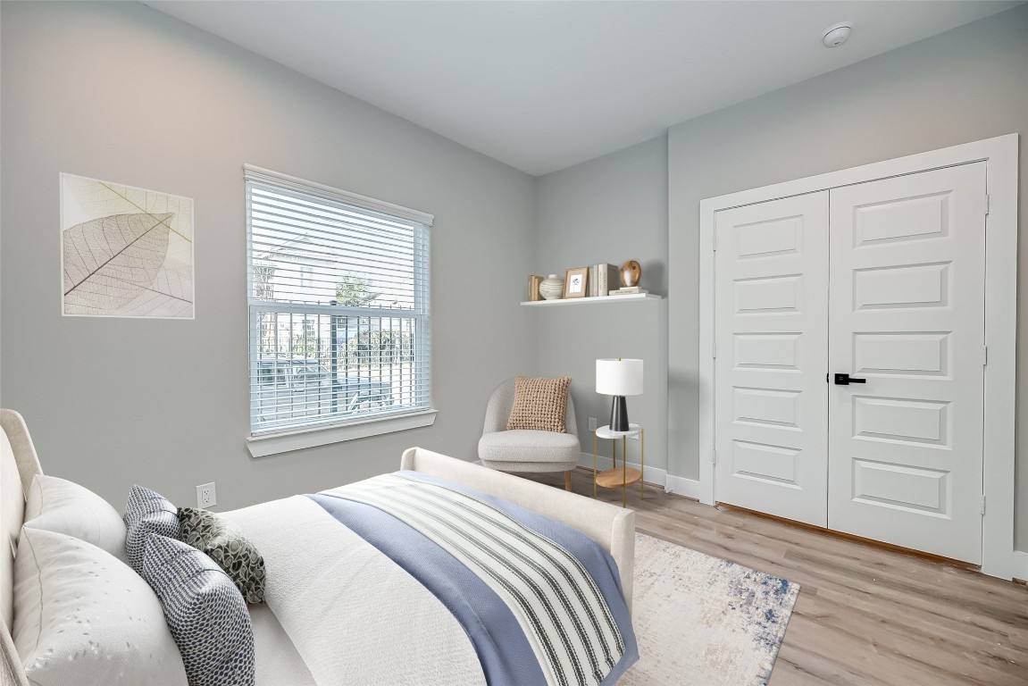 1718 Hardy Street Houston, TX 77026 - Photo 5 of 23 a bedroom with a bed and a window
