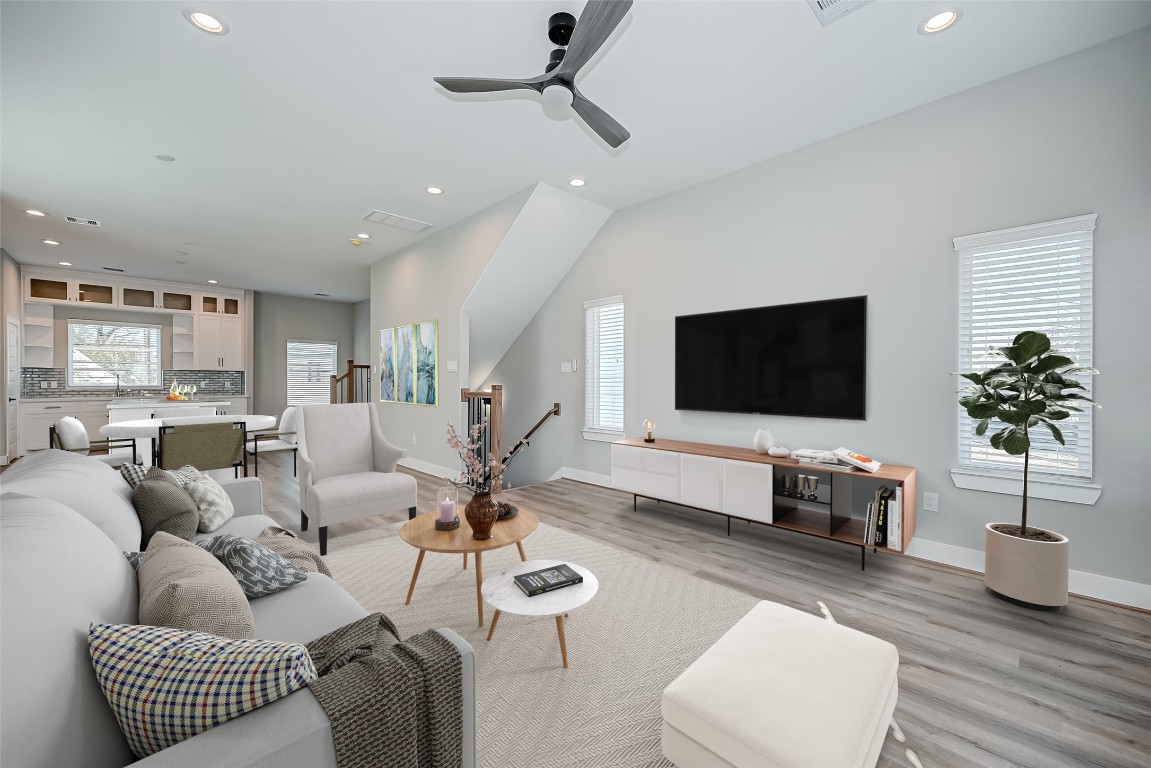1718 Hardy Street Houston, TX 77026 - Photo 9 of 23 a living room with furniture and a flat screen tv