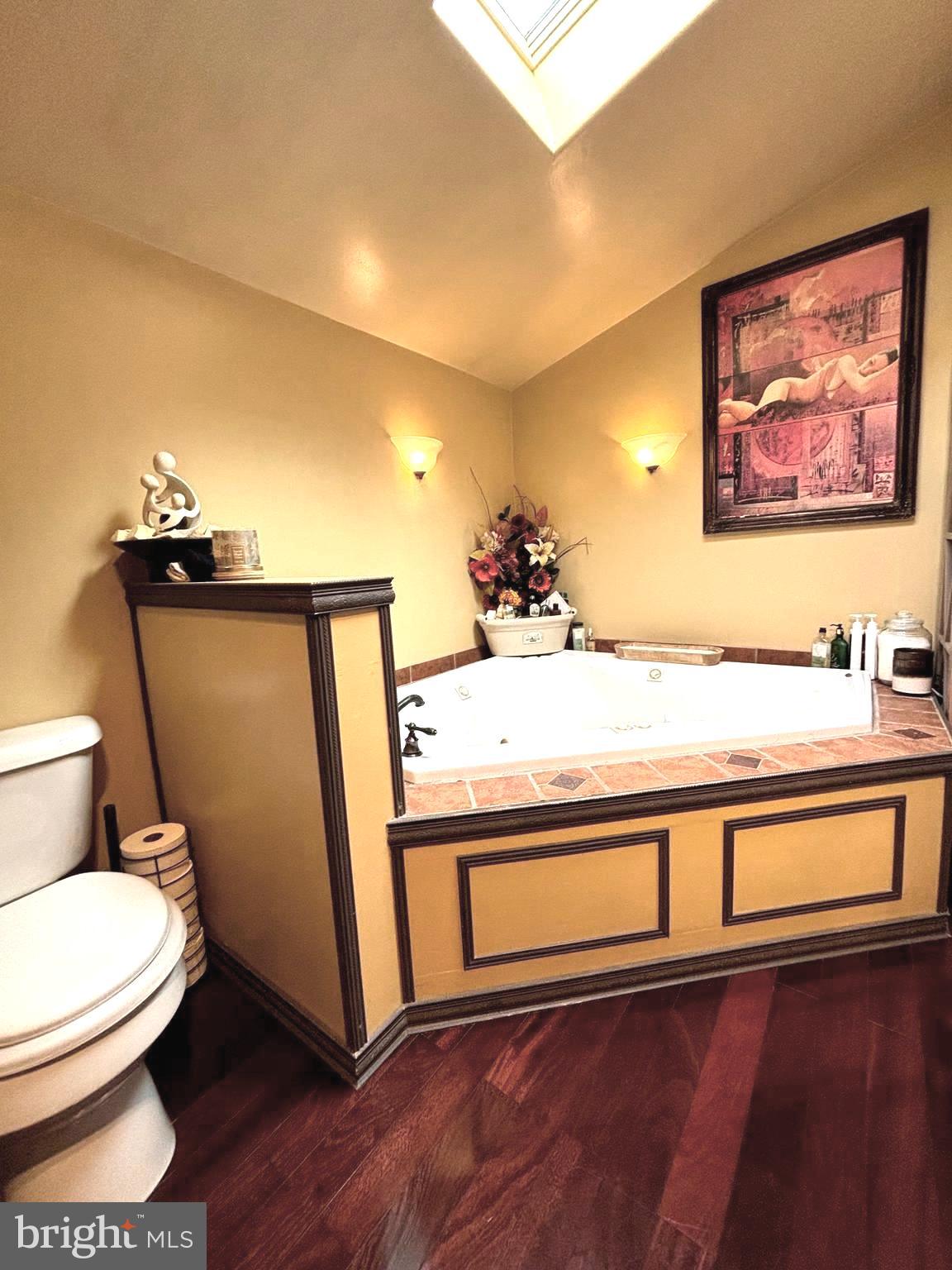 14 Ward Avenue Leesburg, NJ 08327 - Photo 6 of 16 a view of a bathroom with a sink and a toilet