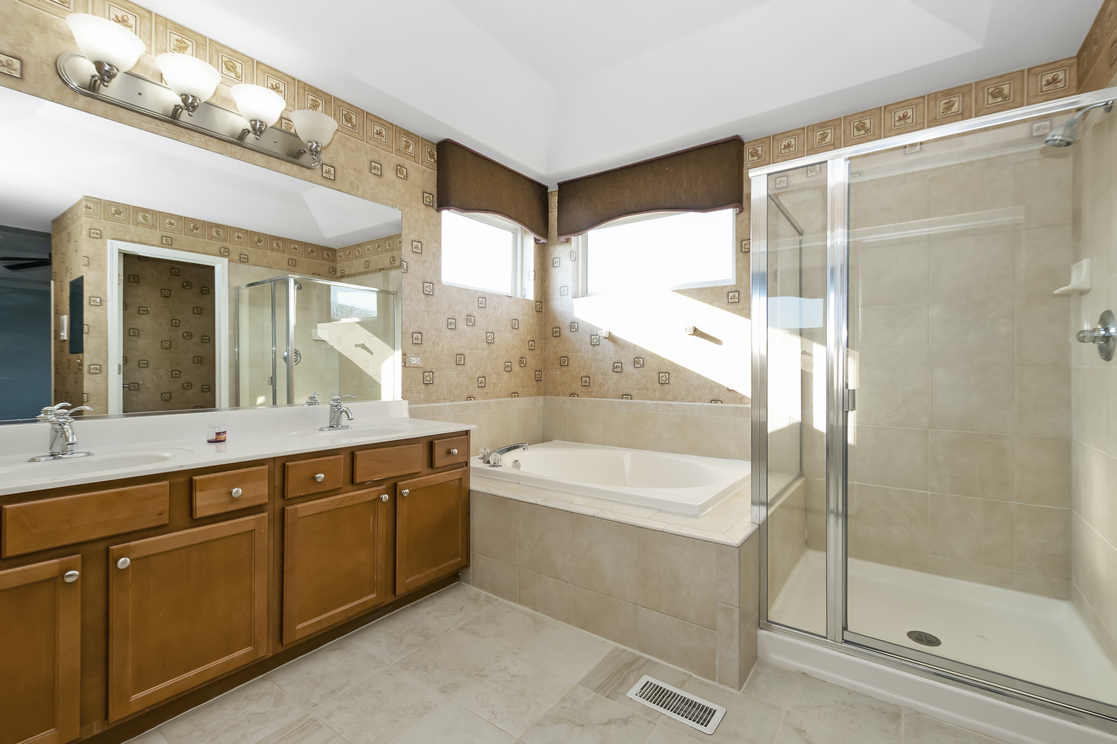 1010 Eagle Point Drive Matteson, IL 60443 - Photo 16 of 27 a bathroom with a bathtub shower sink mirror and toilet