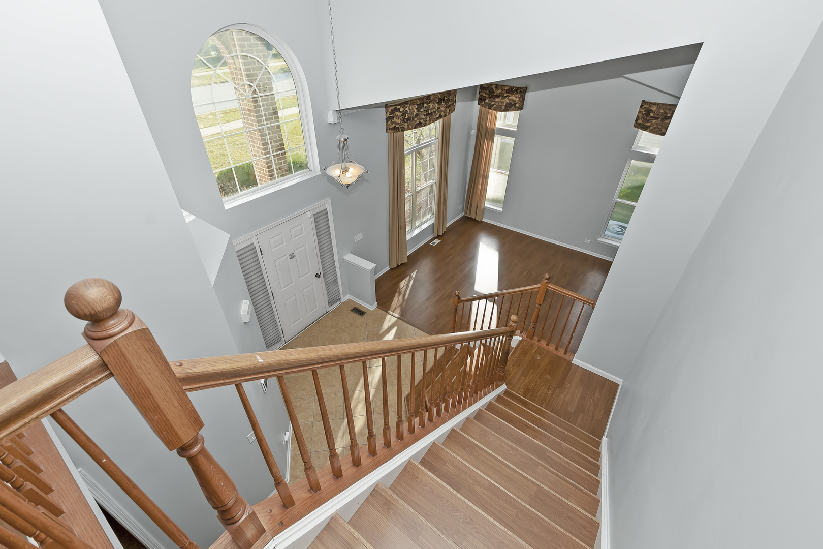 1010 Eagle Point Drive Matteson, IL 60443 - Photo 9 of 27 a view of staircase with railing and white walls