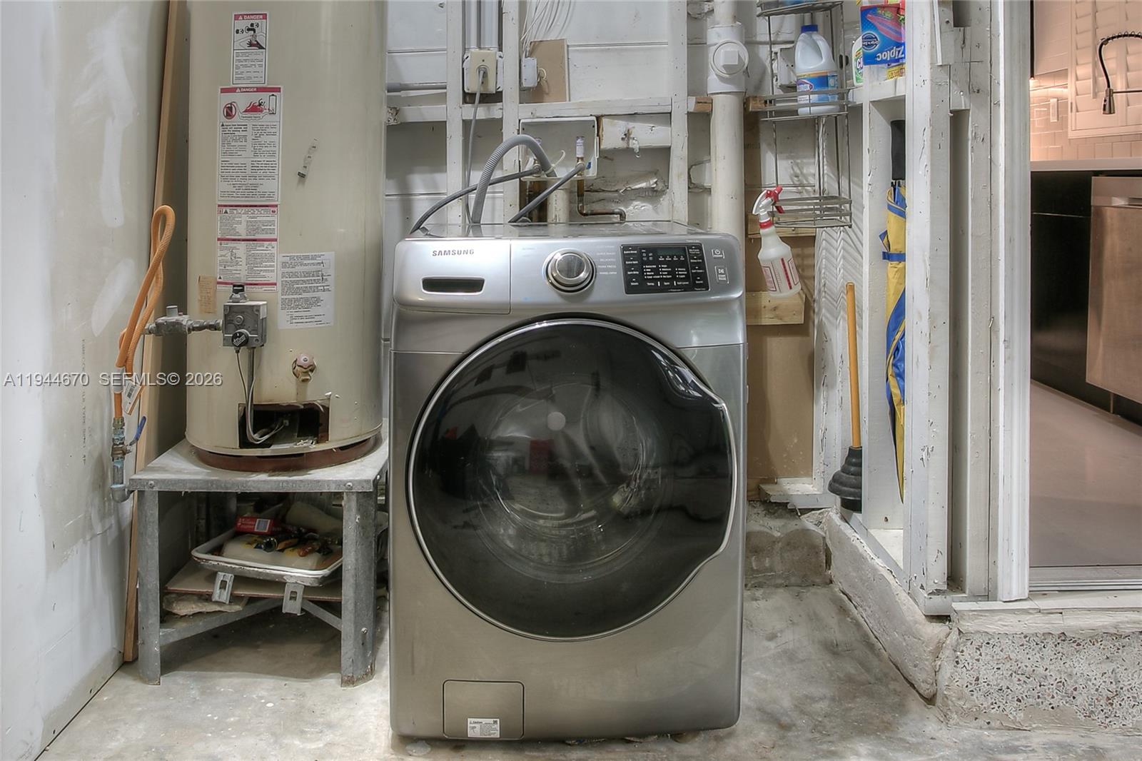 9825 Southwest 196th Street Cutler Bay, FL 33157 - Photo 12 of 14 a utility room with dryer and washer
