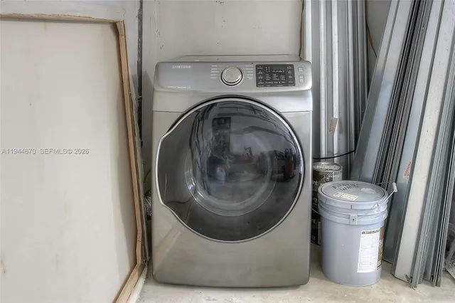 a utility room with a washer and dryer