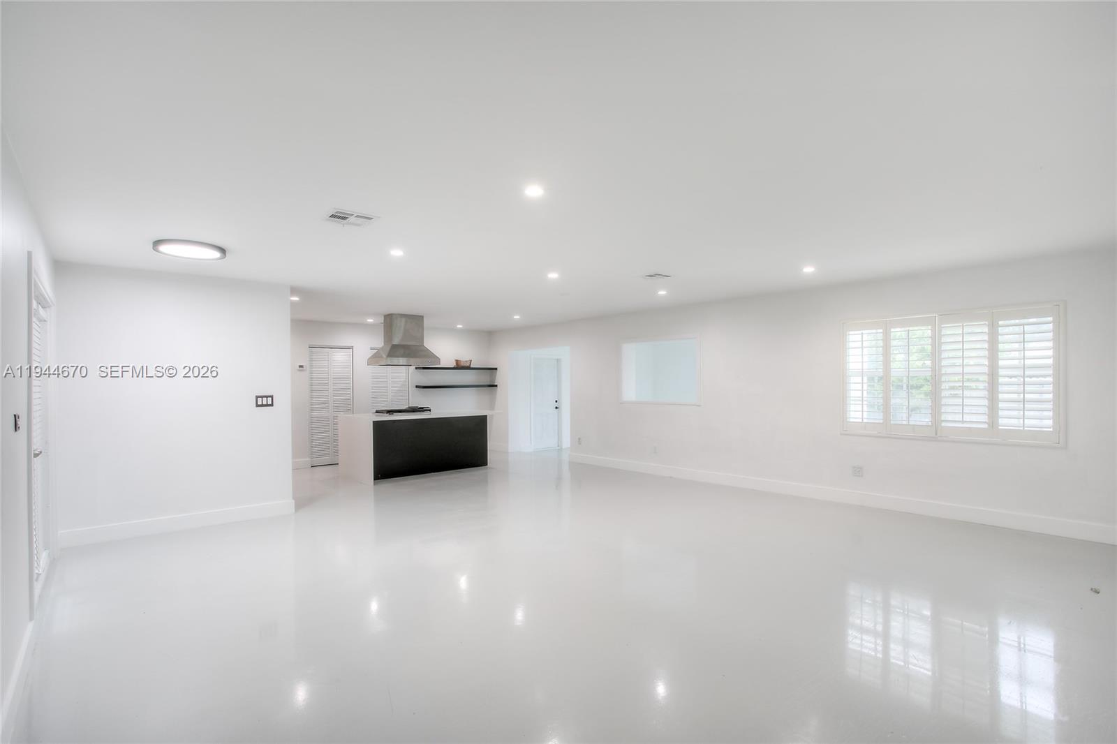 9825 Southwest 196th Street Cutler Bay, FL 33157 - Photo 2 of 14 a view of a kitchen with a sink and a window