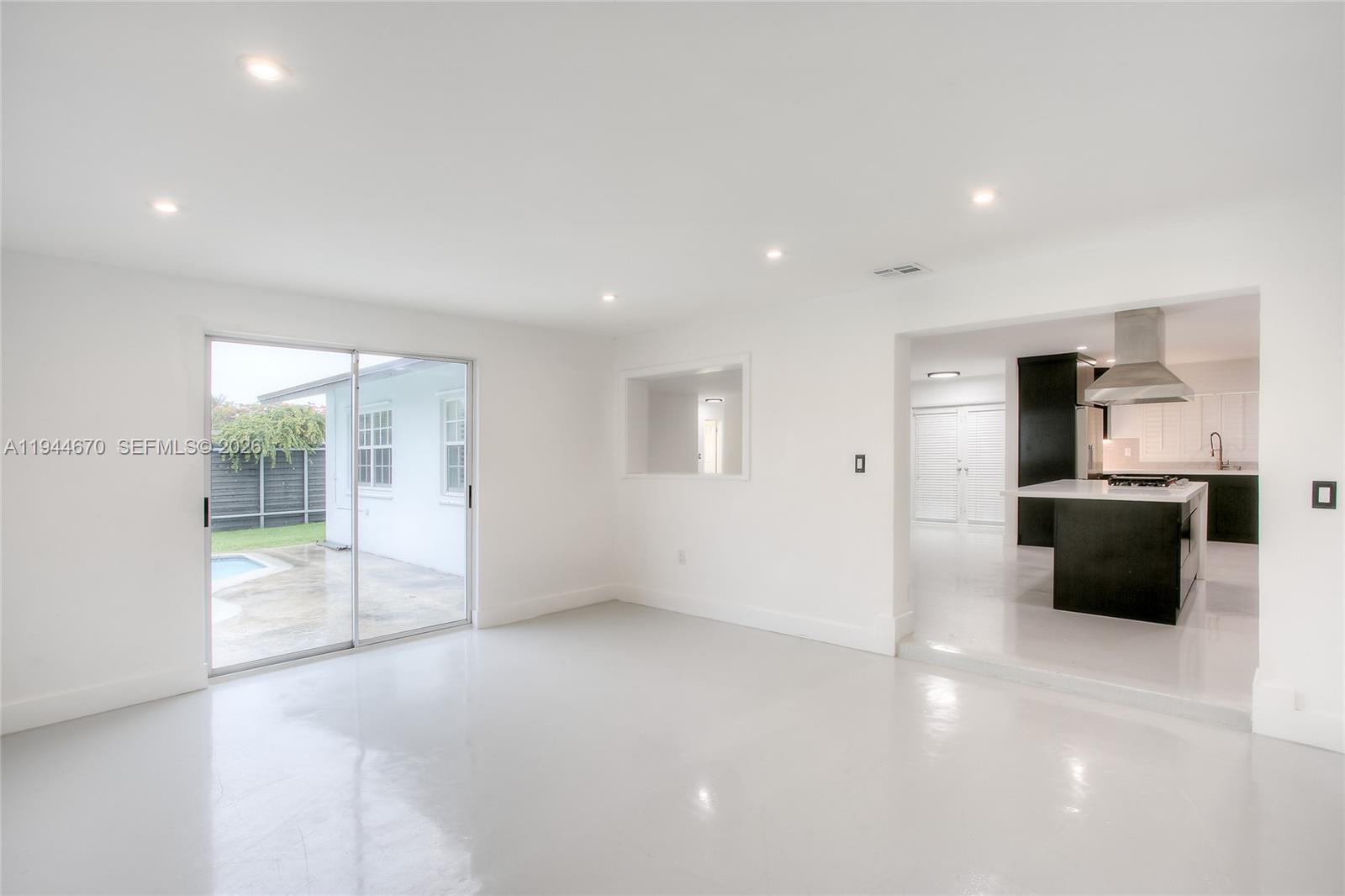 9825 Southwest 196th Street Cutler Bay, FL 33157 - Photo 4 of 14 a view of empty room with wooden floor