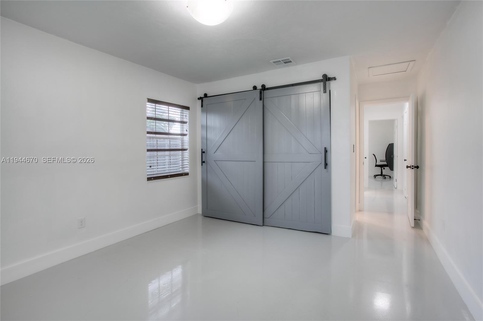 9825 Southwest 196th Street Cutler Bay, FL 33157 - Photo 8 of 14 a view of a room with an empty space