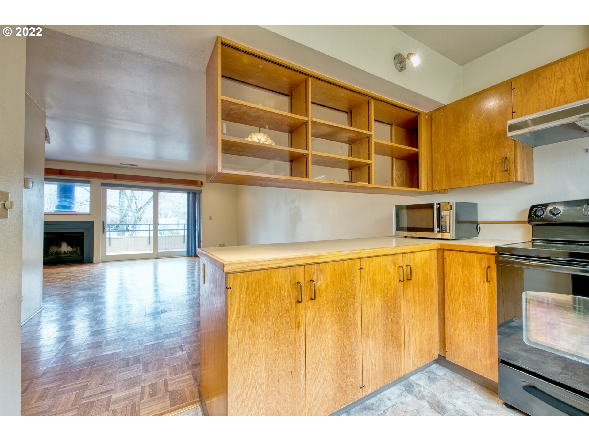 974 Lincoln Street Eugene, OR 97401 - Photo 15 of 32 a view of an empty room with wooden floor and a window