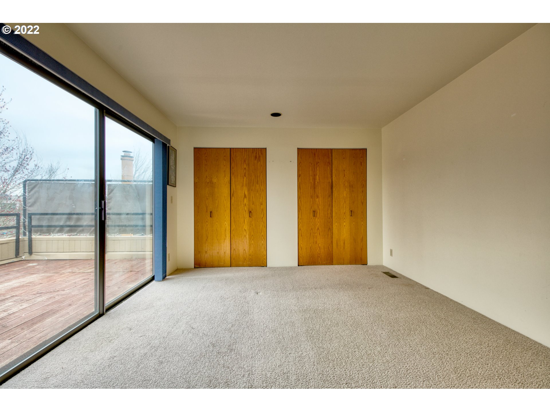 974 Lincoln Street Eugene, OR 97401 - Photo 21 of 32 a view of an empty room with glass door