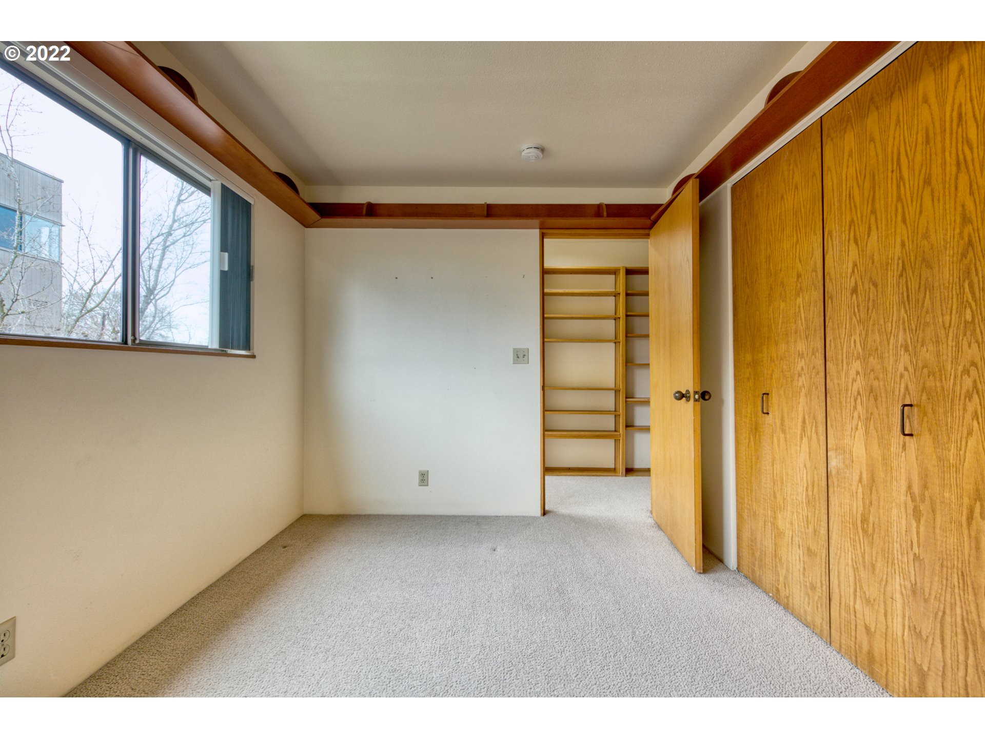 974 Lincoln Street Eugene, OR 97401 - Photo 32 of 32 a view of an empty room with a window