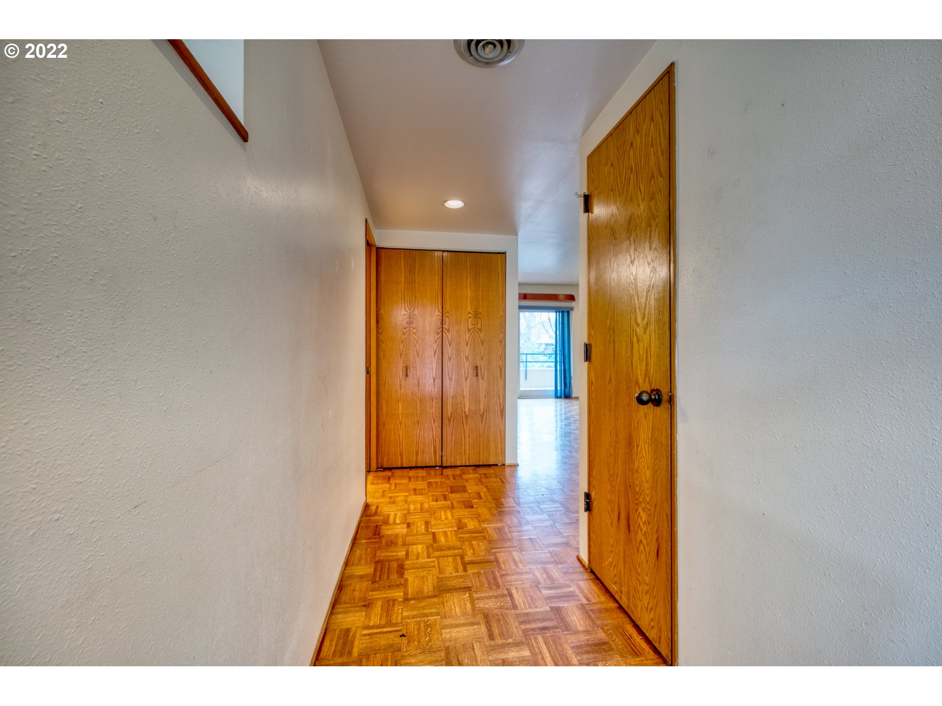 974 Lincoln Street Eugene, OR 97401 - Photo 6 of 32 a view of a hallway with wooden floor